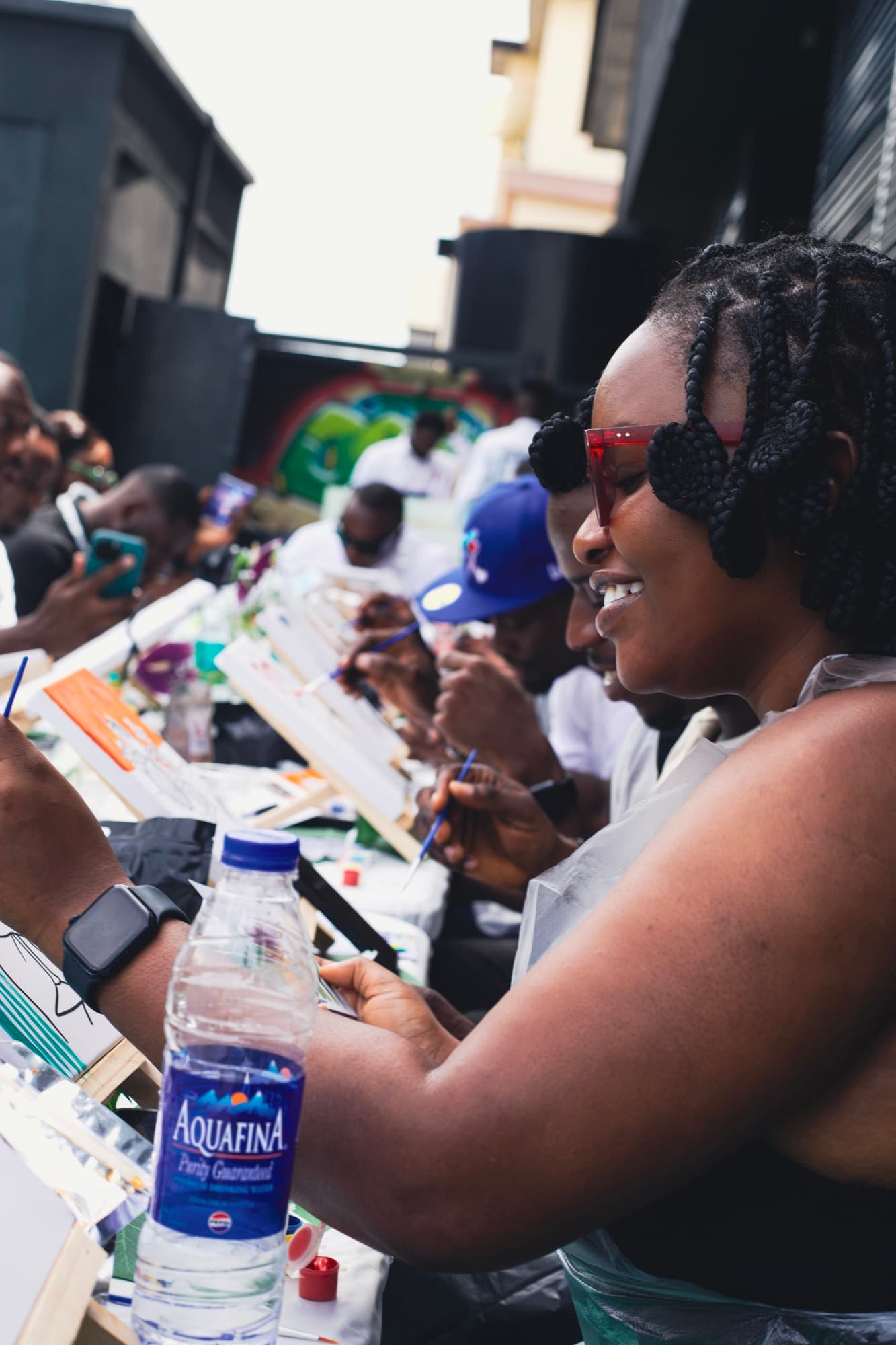 A guest painting at the Sip & Paint session.