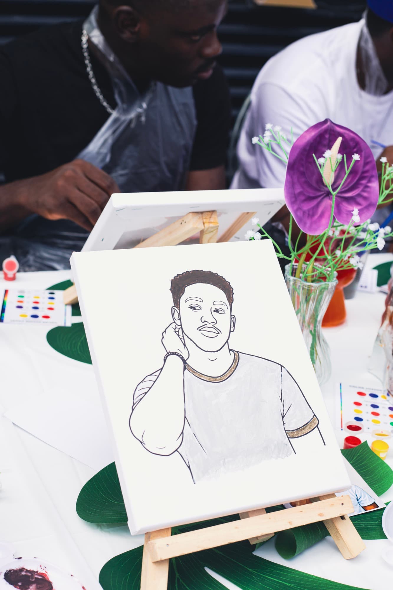 A finished portrait painting from the Sip & Paint session.